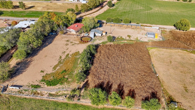 birds eye view of property featuring a rural view