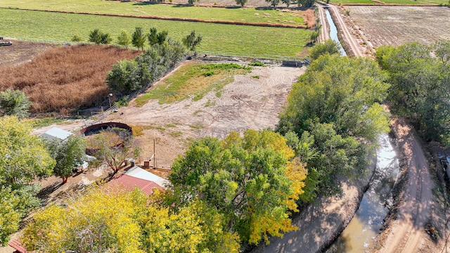 birds eye view of property featuring a rural view