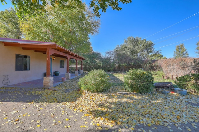 view of yard with a patio area