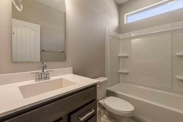 full bathroom with shower / tub combination, vanity, and toilet