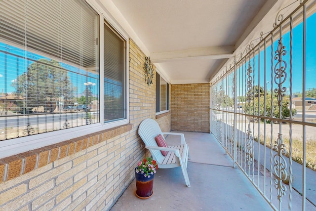 view of patio / terrace with a balcony