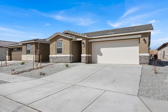 view of front of property with a garage, stone siding, driveway, and stucco siding