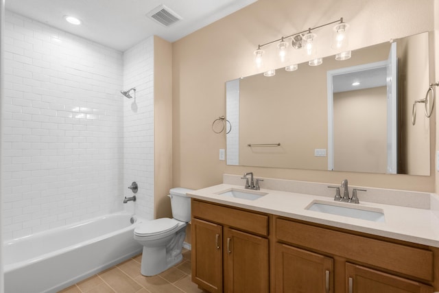 full bathroom with tile patterned flooring, toilet, visible vents, and a sink