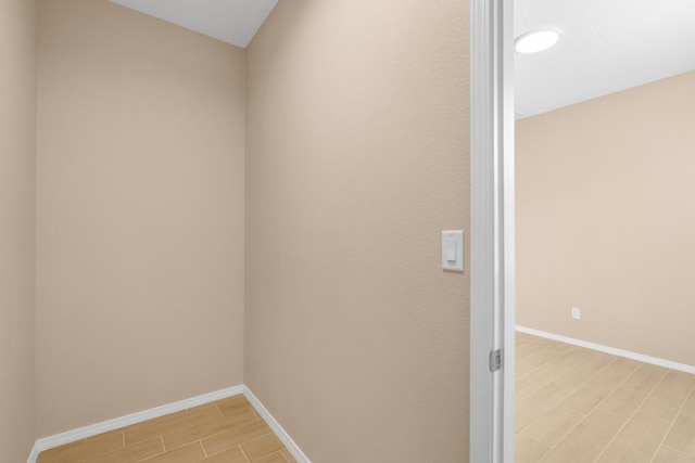 interior space with light wood-type flooring and baseboards