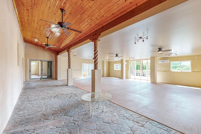 carpeted spare room featuring wooden ceiling, a wall mounted AC, and lofted ceiling