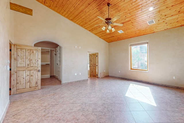 spare room with high vaulted ceiling, light tile patterned flooring, and wood ceiling