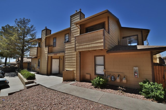 view of front of house with a balcony