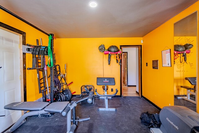 exercise area with hardwood / wood-style flooring