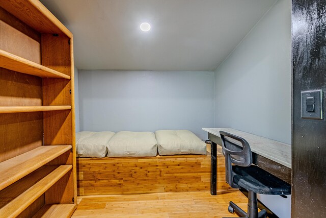 bedroom with light wood-type flooring