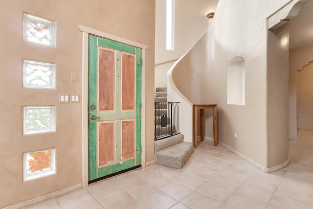 view of tiled foyer entrance