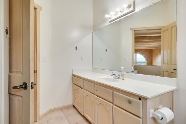 bathroom with tile patterned flooring and vanity