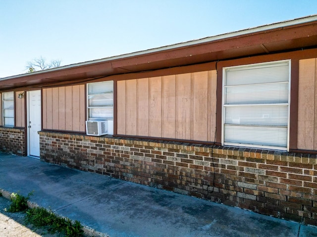 view of side of property featuring a patio