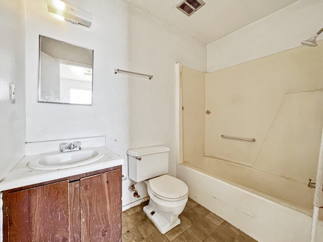 full bathroom featuring tile floors, shower / tub combination, toilet, and vanity