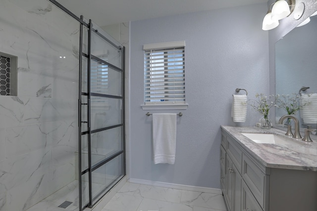 bathroom featuring vanity and an enclosed shower