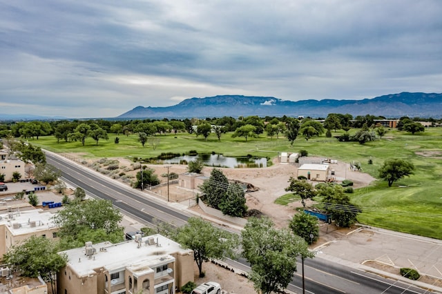 aerial view featuring a water and mountain view