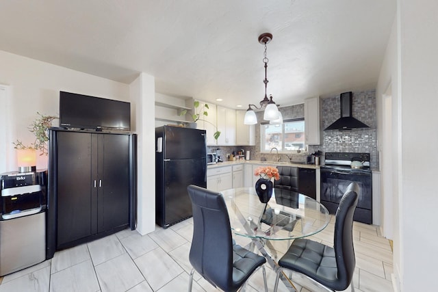 dining space with sink