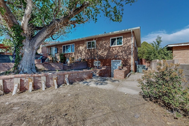 rear view of house with a patio area