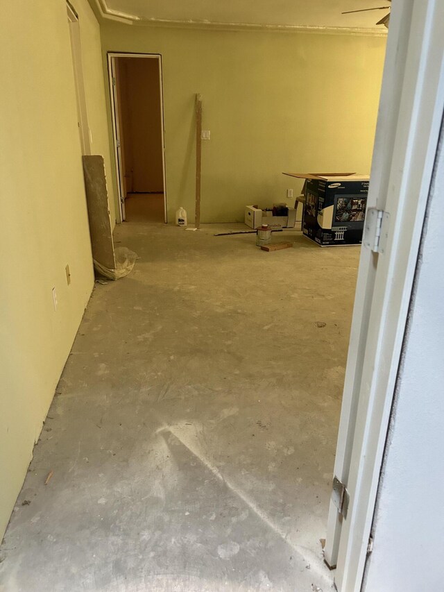 hallway with concrete flooring