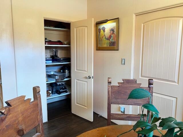 home office featuring dark hardwood / wood-style flooring