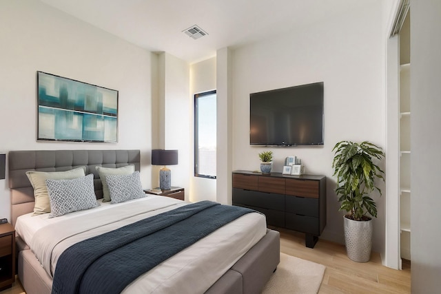 bedroom featuring light hardwood / wood-style floors