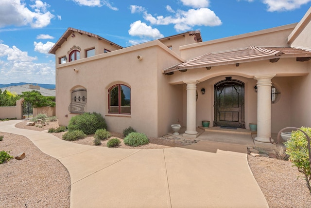 view of front of home with a mountain view