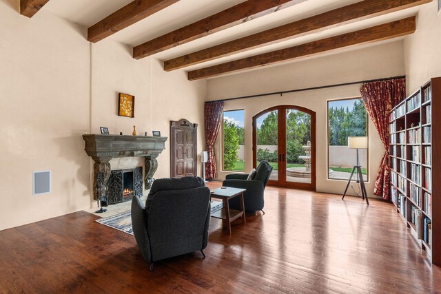 living room with french doors and hardwood / wood-style floors