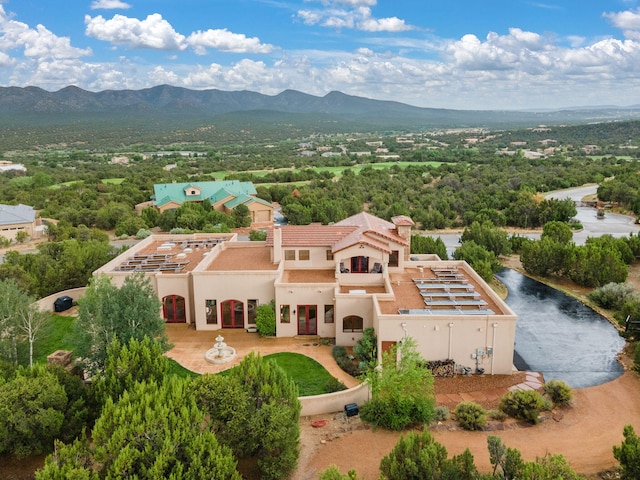 bird's eye view with a mountain view