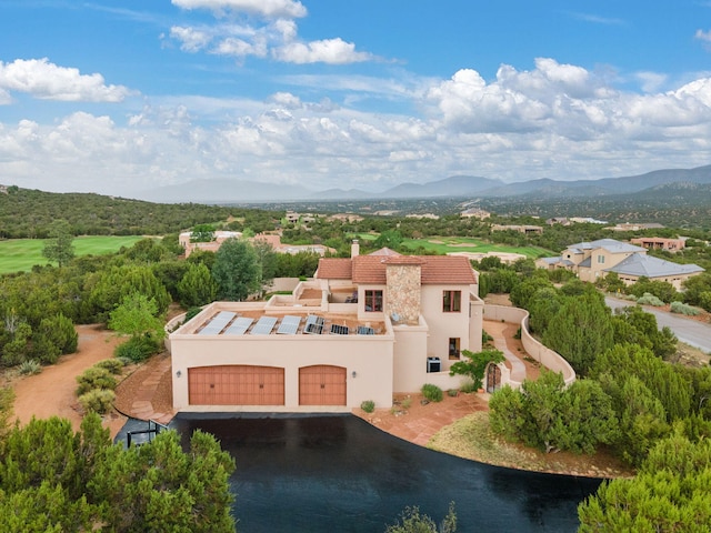 aerial view with a water and mountain view