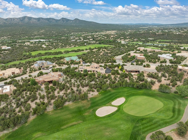 birds eye view of property featuring a mountain view