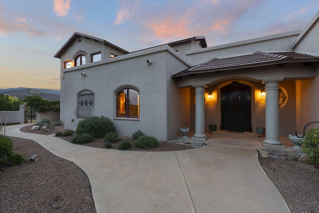 mediterranean / spanish-style house featuring a mountain view