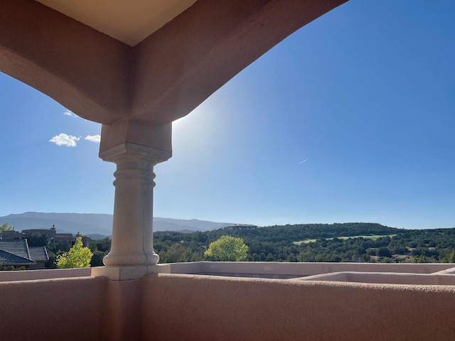 balcony featuring a mountain view