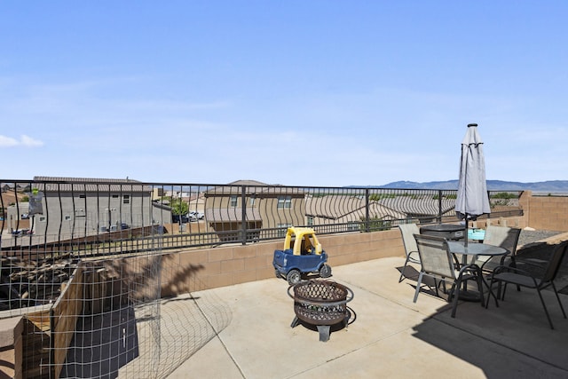 view of patio featuring a mountain view