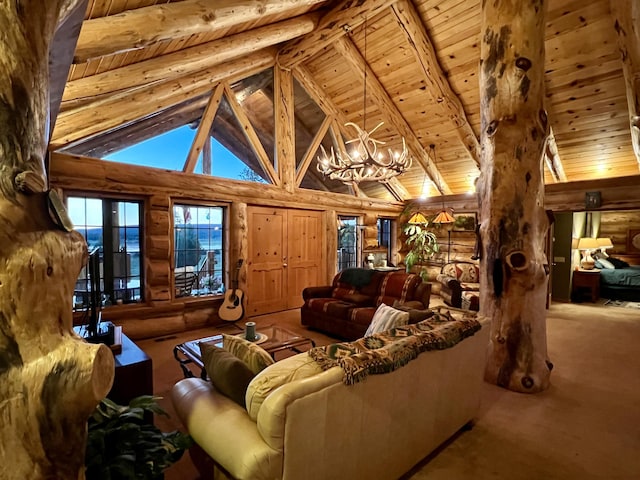 living room with wooden ceiling, log walls, a notable chandelier, and beamed ceiling