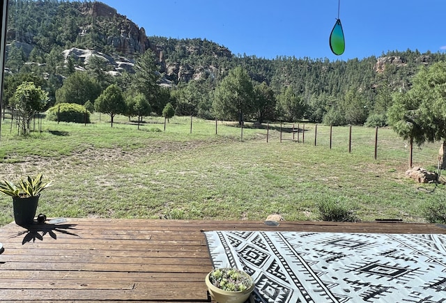 view of yard with a wooded view