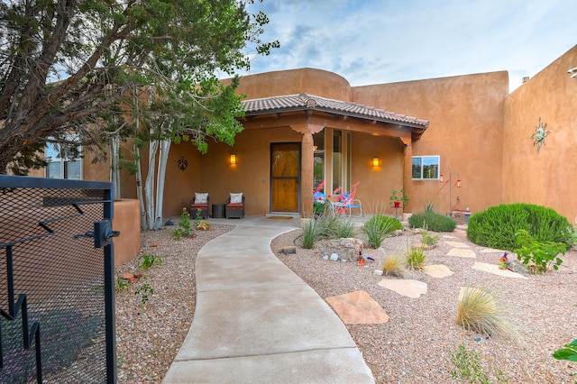 view of adobe home