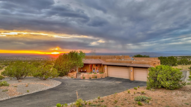 view of front of house with a garage