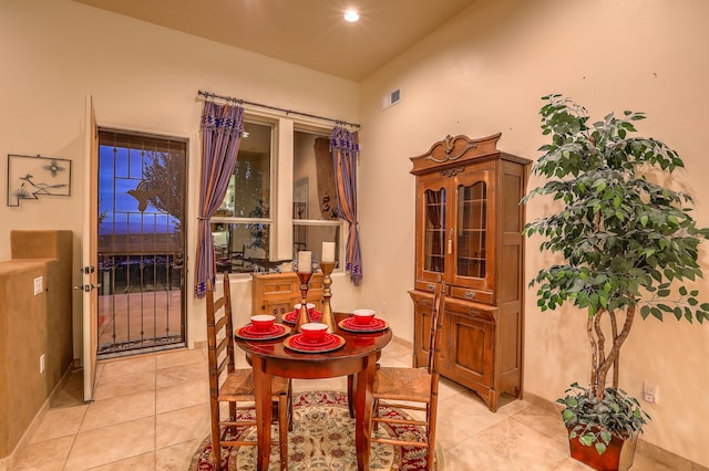 dining room featuring light tile patterned floors