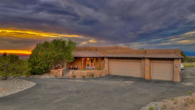 view of front of property with a garage