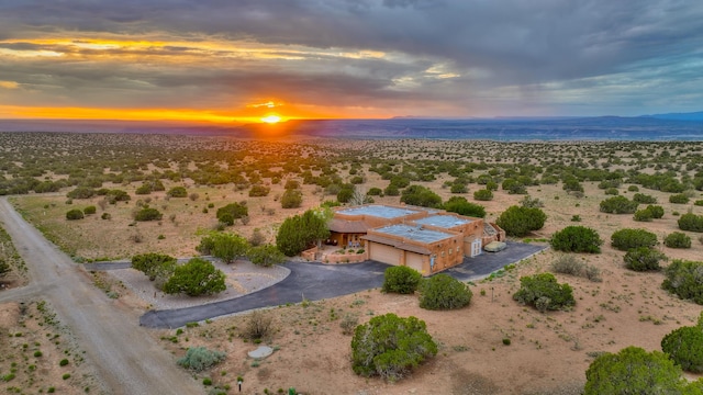 view of aerial view at dusk