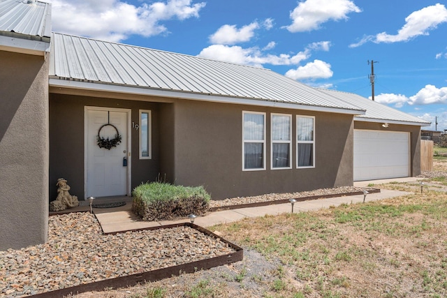 entrance to property with a garage