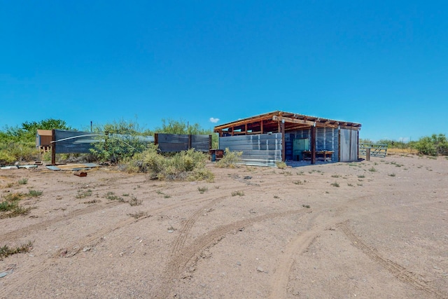 exterior space featuring an outdoor structure