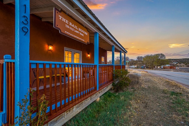 view of property exterior at dusk