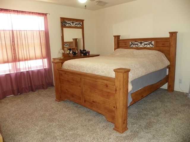 bedroom with light carpet