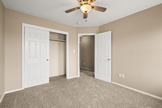 unfurnished bedroom featuring a closet, carpet, and ceiling fan