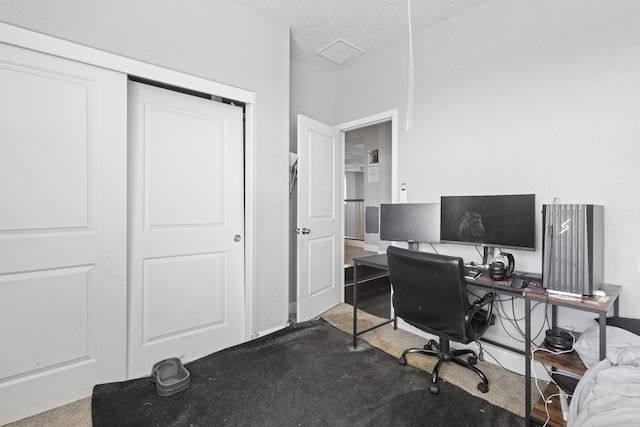 office area featuring a textured ceiling