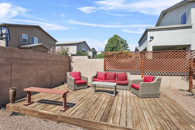 wooden deck featuring an outdoor living space