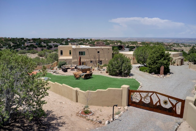 rear view of house with a patio