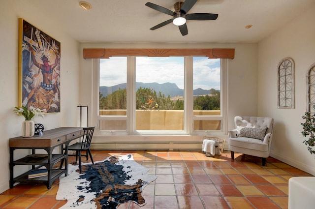 kitchen featuring stainless steel appliances, sink, light tile patterned floors, decorative backsplash, and ceiling fan