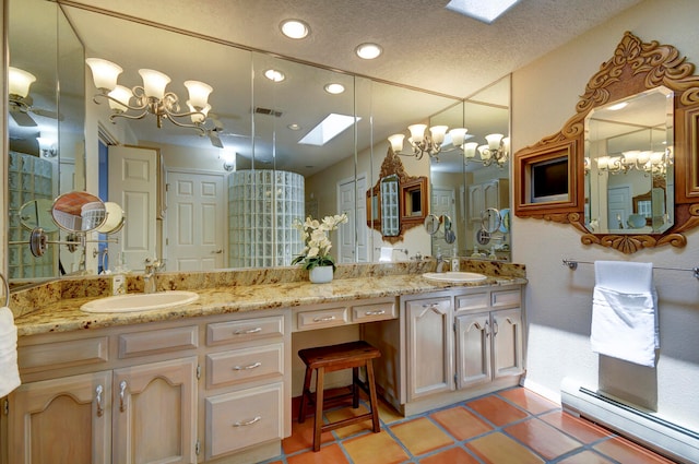 empty room featuring plenty of natural light, ceiling fan, light tile patterned flooring, and a baseboard heating unit