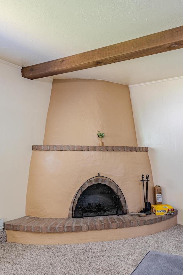 room details featuring carpet floors and beam ceiling